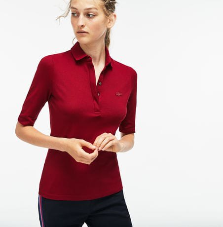 burgundy polo shirt with half sleeves and black nylon running shorts
