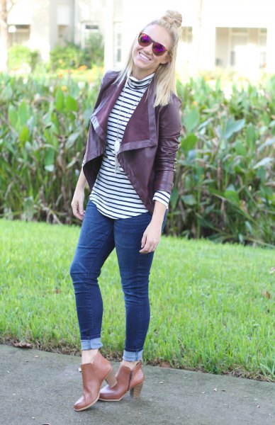 Burgundy short leather blazer jacket with black and white striped T-shirt with stand-up collar