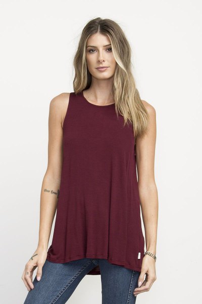 Burgundy tunic tank top with gray-blue skinny jeans