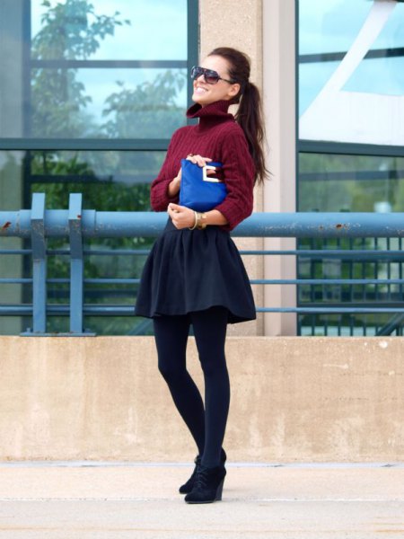 Burgundy turtleneck sweater with turtleneck, skater skirt and black wedge boots