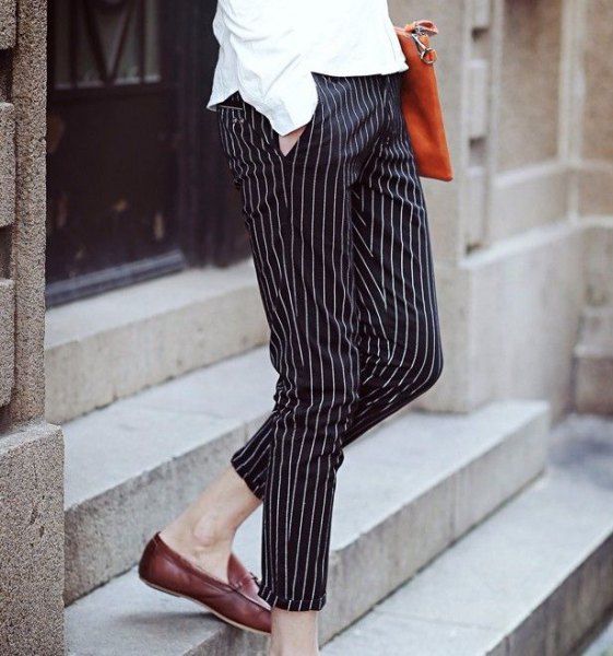 Shirt with buttons and black and white striped pants