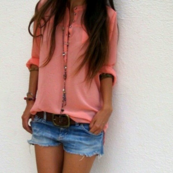 Button-up shirt with blue mini denim shorts and black belt
