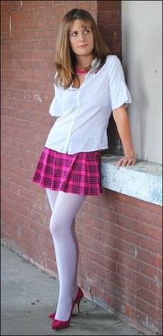 Button-up shirt with a pink plaid skirt and white leggings