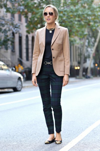 Camel blazer with black t-shirt and dark gray checked pants