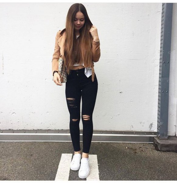 Camel blazer with a cropped white blouse and black skinny jeans