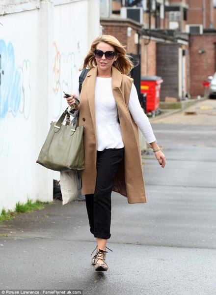 Camel long coat with a white long sleeve t-shirt