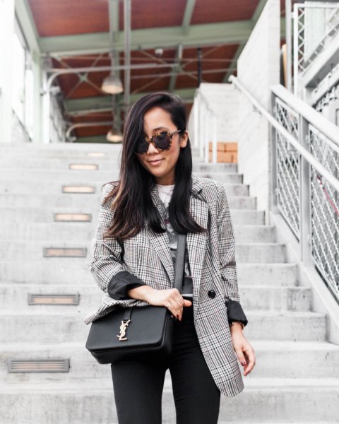 Checked blazer with a white printed T-shirt and black skinny jeans