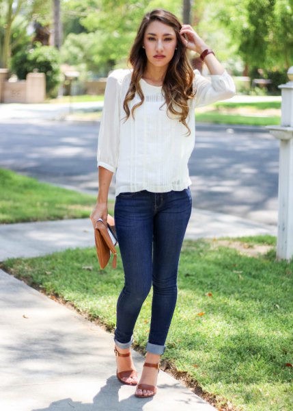 Skinny jeans with a chiffon blouse and cuff