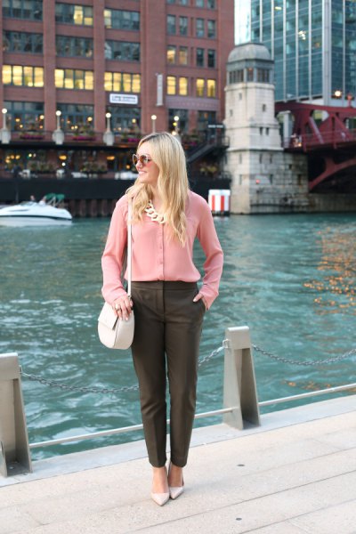Chiffon shirt with button placket with statement chain and gray chinos