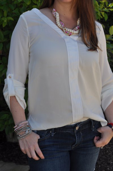 semi-transparent chiffon blouse with dark blue skinny jeans