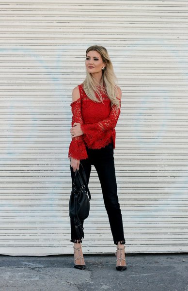 cold shoulder bell-sleeved blouse with black ankle jeans
