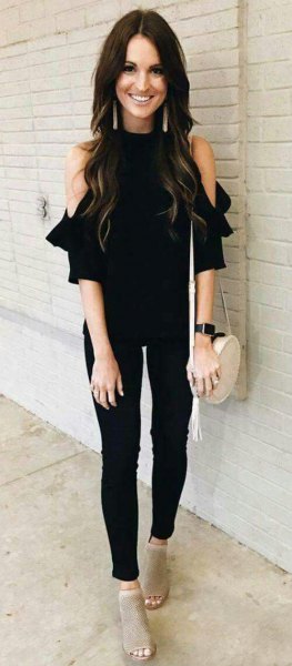 cold black shoulder blouse with narrow pants and gray short boots with open toes