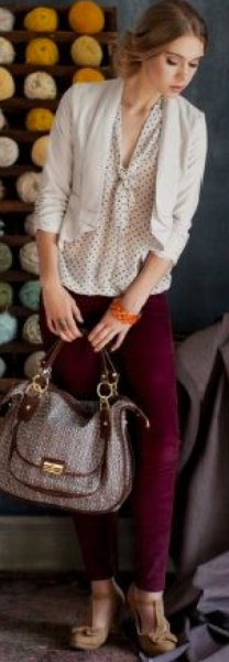 cream and black polka dot blouse with tie neck and light pink blazer