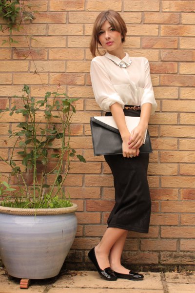 Cream-colored shirt with buttons and black, straight midi dress