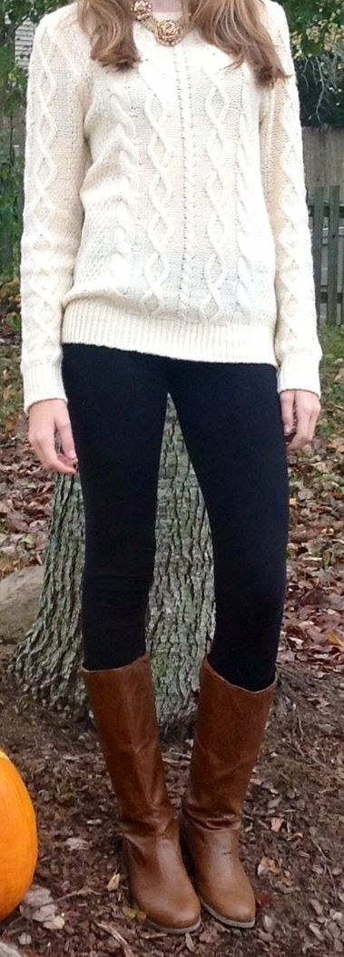 cream-colored calbe knit sweater, black skinny jeans