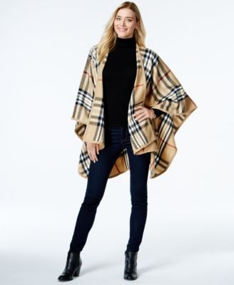 Crepe and black checked poncho turtleneck with a figure-hugging fit