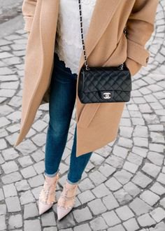 Crepe long woolen coat with a black quilted small leather handbag