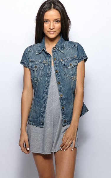 Dark blue denim jacket with short sleeves and a gray mini dress