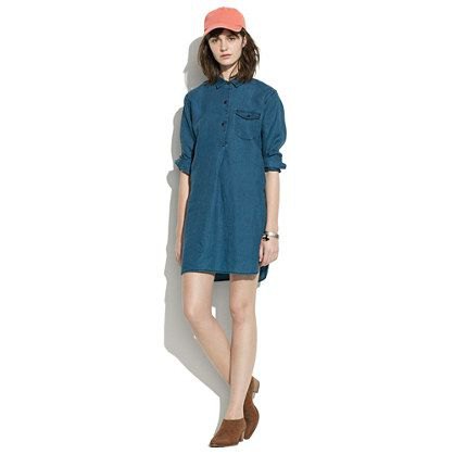 dark blue tunic with unwashed collar and baseball cap