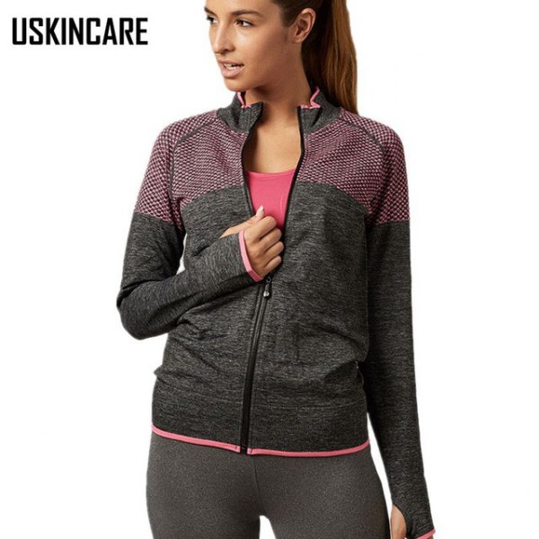 dark gray shorts jacket with pink top and running gaiters
