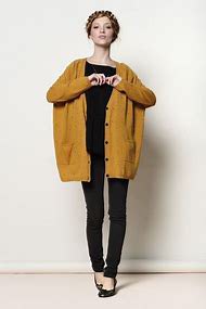 dark mustard yellow, chunky knitted sweater with black t-shirt