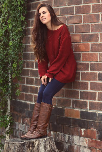 Dark red tunic sweater with boat neckline, dark blue leggings and knee-high boots
