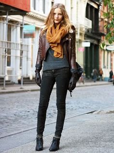 dark brown short leather jacket with gray knitted sweater