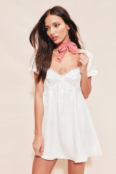 deep white baby doll dress with v-neck, pink scarf