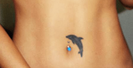 Dolphin belly button tattoo design