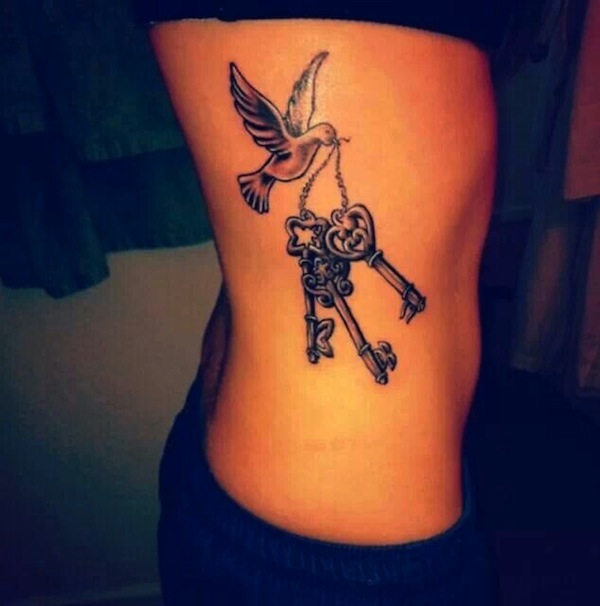 Dove with key tattoo design