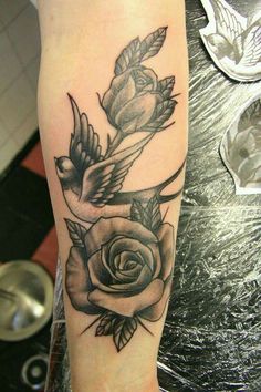 Dove with rose tattoo