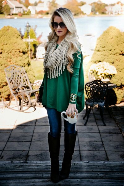 Emerald green peplum long-sleeved top with infinity scarf with fringes