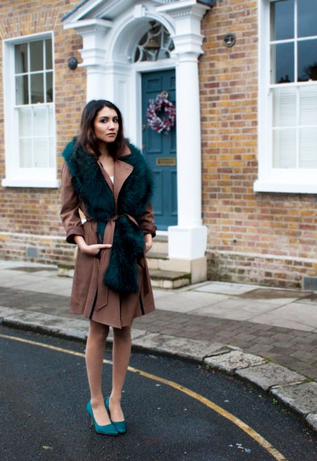 Trench coat with a faux fur scarf