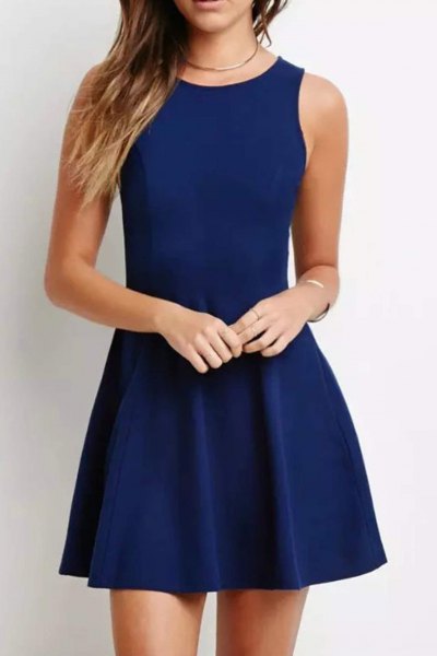 sleeveless dark blue mini cocktail dress with fit and flare