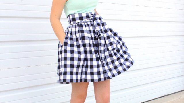 fitted halterneck top with black and white checked minirater skirt