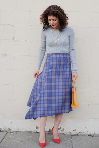 fitted sweater with blue and gray midi skirt