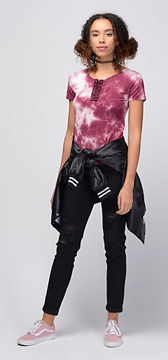 fitted t-shirt with black skinny jeans with cuffs and bomber jacket