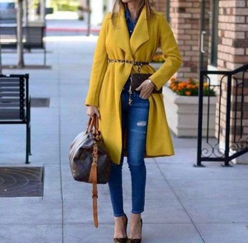 Long-liner yellow coat with fleece belt and skinny jeans with blue ankles