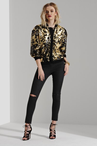 gold and black bomber jacket ripped skinny jeans