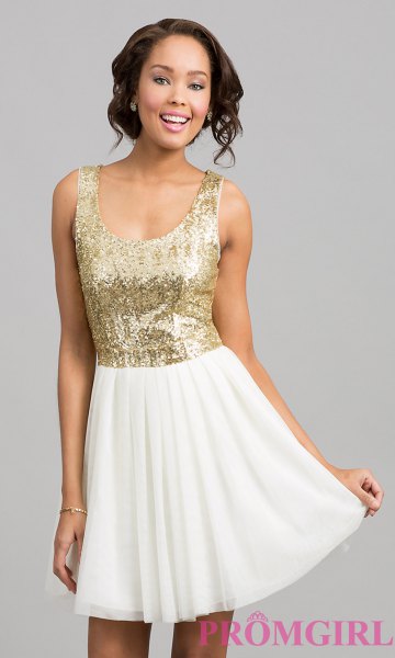 golden sequin top with scoop neckline and white minirater skirt