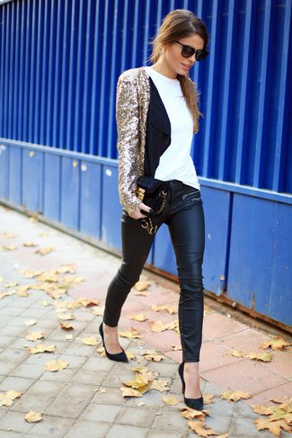 golden sequin jacket with black leather gaiters