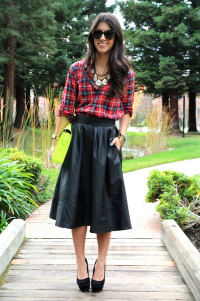 green-blue checked shirt with black flared midi leather skirt