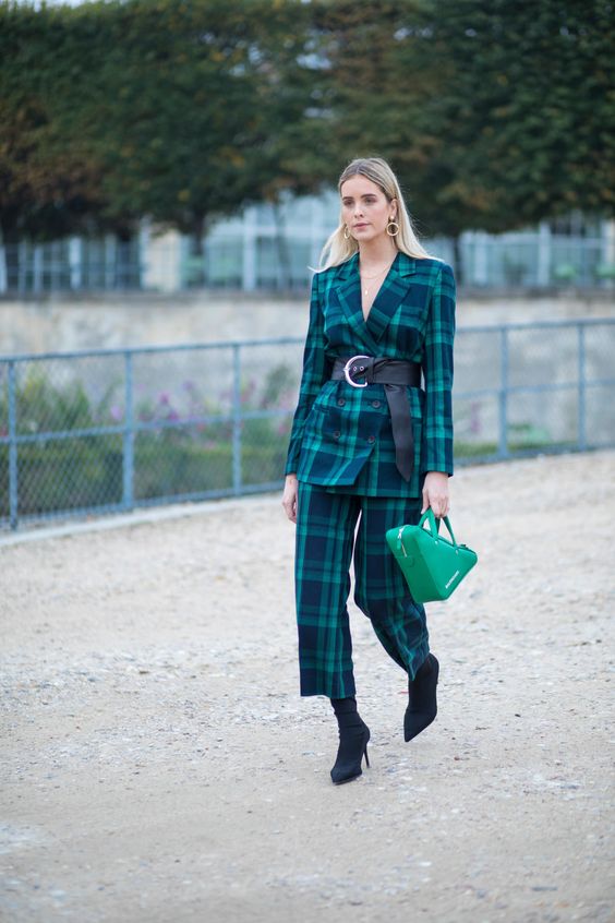 Checked pants suit with a green blazer