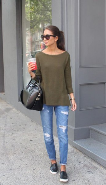 green blouse with boat neckline and blue ribbed slim fit jeans