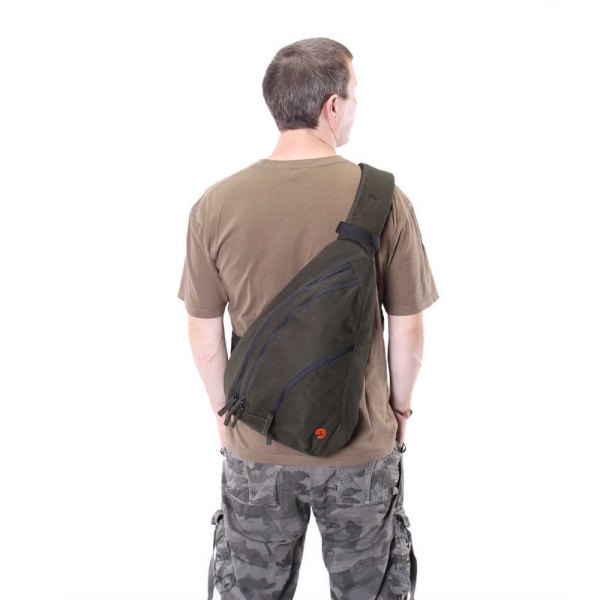 green canvas bag with camouflage pants