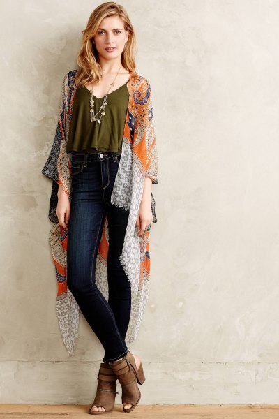 green short top with spaghetti straps, silk cape and dark jeans
