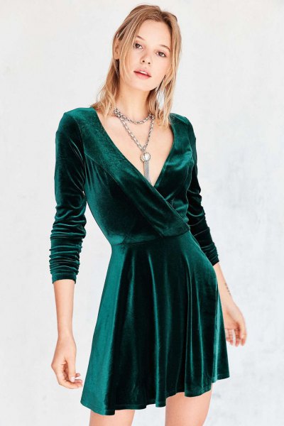 green wrap skater dress with deep V-neckline