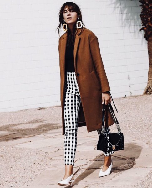 green longline blazer with black and white checked trousers