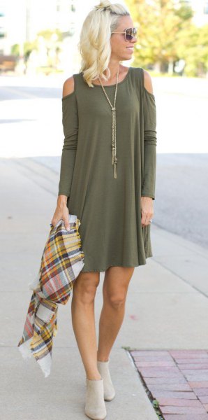 green long-sleeved mini dress with open shoulder