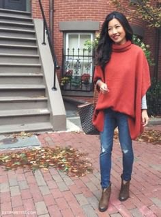 green oversized poncho sweater with mock neck and sleeves